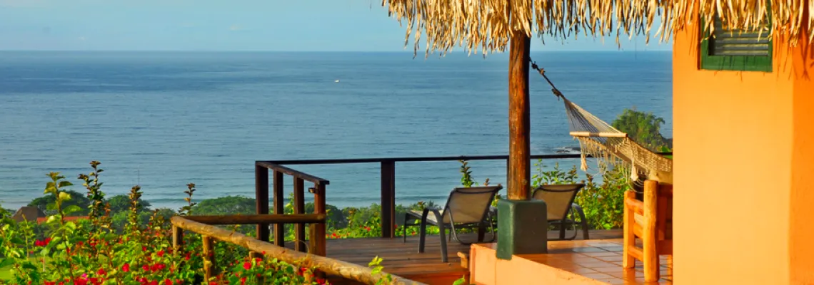 Room exterior gardens and ocean view at Punta Islita